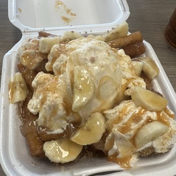 Cookie Dough Monster - Funnel fries with Carmel and banana and vanilla ice cream. - Bakeries Near Me - Pigeon Forge, Tennessee Cookie Dough Monster - Funnel fries with Carmel and banana and vanilla ice cream. - Bakeries Near Me - Pigeon Forge, Tennessee