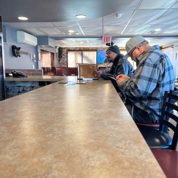 Rosetta’s Jazz Cafe - two men sitting at the bar - Jazz & Blues Near Me - Morrisville, Pennsylvania Rosetta’s Jazz Cafe - two men sitting at the bar - Jazz & Blues Near Me - Morrisville, Pennsylvania