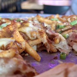 Poutine pizza. Soooooo good Poutine pizza. Soooooo good