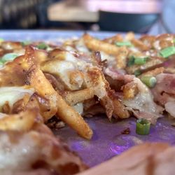 Garage Bowling & Bar - Poutine pizza. Soooooo good