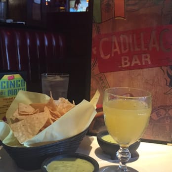 Cadillac Bar - mimosa and complimentary chips and salsa. - Tex-Mex Near Me - Houston, Texas