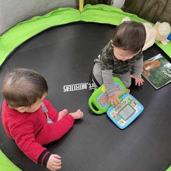 Vali Daycare - My son in the green playing with his friend in daycare - Child Care & Day Care Near Me - Corona, California