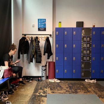 Solidcore - Chelsea - Lockers and front area of studio - Pilates Near Me - New York, New York Solidcore - Chelsea - Lockers and front area of studio - Pilates Near Me - New York, New York