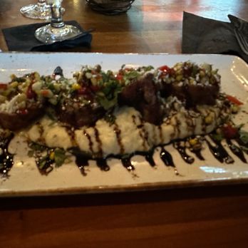 Roaring Fork - Bacon wrapped pork tenderloin! Mouth watering. - American Near Me - Austin, Texas