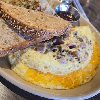 Snooze, an A.M. Eatery - Protein Trio Omelet* - Breakfast & Brunch Near Me - Cedar Park, Texas Snooze, an A.M. Eatery - Protein Trio Omelet* - Breakfast & Brunch Near Me - Cedar Park, Texas