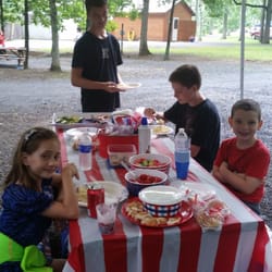 Dogwood Acres Campgrounds - There are picnic tables and porches at many of their lots. Great 4th of July destination for some clean fun and R and R.