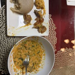 Nigerian Food - Egusi soup with bad leftover goat meat