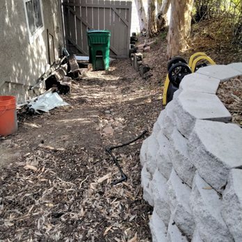 GL Landscape - a pile of rocks in a backyard - Landscaping Near Me GL Landscape - a pile of rocks in a backyard - Landscaping Near Me