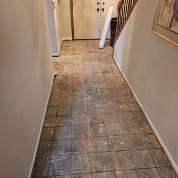 Hanell Home Services - Hallway after tile demo. - Handyman Near Me - Bettendorf, Iowa