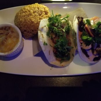 Yard House - Tacos with rice and beans. One Korean BBQ and one Al Pastor - New American Near Me - Orlando, Florida