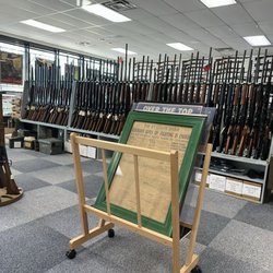 Andy's Military & Sporting Collectibles Shop - Shot guns and other