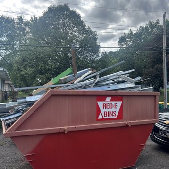RED-E-BINS - Picture of our dumpster before we called to troubleshoot getting it all to fit. - Dumpster Rental Near Me - Saint Louis Park, Minnesota RED-E-BINS - Picture of our dumpster before we called to troubleshoot getting it all to fit. - Dumpster Rental Near Me - Saint Louis Park, Minnesota