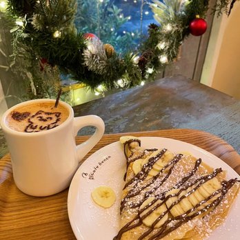 Cafe Bench - Hot Chocolate and Nutella Addict Crepe w/ bananas - Cafes Near Me - Flushing, New York Cafe Bench - Hot Chocolate and Nutella Addict Crepe w/ bananas - Cafes Near Me - Flushing, New York