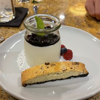 The Whistling Grizzly - Huckleberry Panna Cotta with biscotti - American Near Me - Jackson, Wyoming The Whistling Grizzly - Huckleberry Panna Cotta with biscotti - American Near Me - Jackson, Wyoming