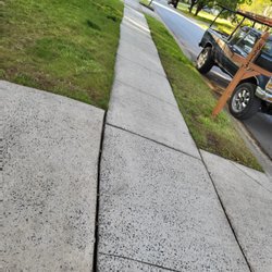 W.R Pressure Washing Services - Street sidewalk power washed.