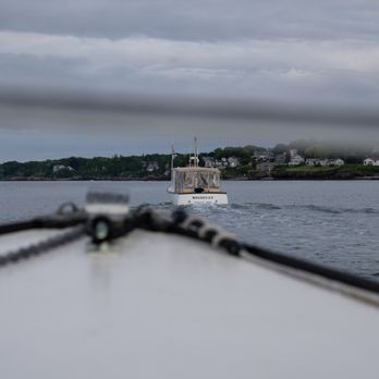 Casco Bay Custom Charters - View off the front of our boat charter, following our other vessel into the harbor. - Boat Charters Near Me - Portland, Maine