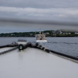 Casco Bay Custom Charters - View off the front of our boat charter, following our other vessel into the harbor.