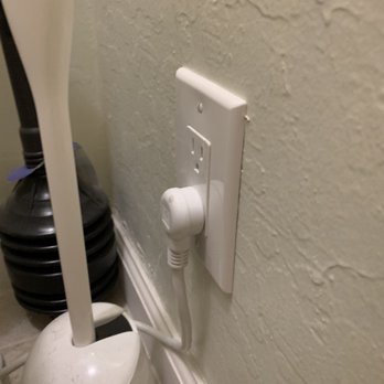 Bay Power And Lighting - 20a outlet installed in bathroom next to toilet. - Electricians Near Me Bay Power And Lighting - 20a outlet installed in bathroom next to toilet. - Electricians Near Me