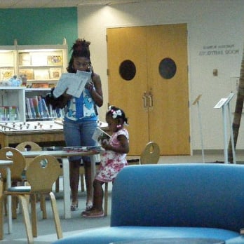Richland Library Main - Mom and daughter reading at RCPL - Libraries Near Me - Columbia, South Carolina Richland Library Main - Mom and daughter reading at RCPL - Libraries Near Me - Columbia, South Carolina