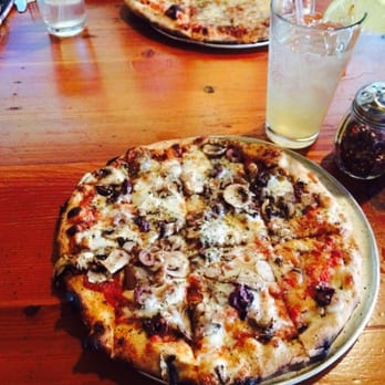 Flatbread Company - Casco Bay Community flatbread w/ olives & lemonade - Pizza Near Me - Portland, Maine Flatbread Company - Casco Bay Community flatbread w/ olives & lemonade - Pizza Near Me - Portland, Maine