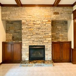 Royal Oak Renovations - Alamo Stone Creekside fireplace.