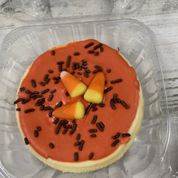 Trish's Specialty Cheese Cakes - Happy harvest, candy corn baked inside, with Homemade icing, a few sprinkles,and there you have it, happy harvest.