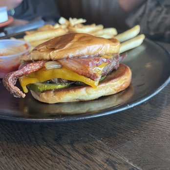 Slater's 50/50 - Half eaten lone star burger - Burgers Near Me - Denver, Colorado