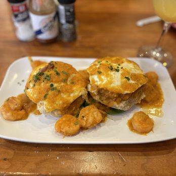 Ruby Slipper Central Business District - Shrimp, fried green tomatoes, eggs over medium, on a biscuit - Breakfast & Brunch Near Me - New Orleans, Louisiana Ruby Slipper Central Business District - Shrimp, fried green tomatoes, eggs over medium, on a biscuit - Breakfast & Brunch Near Me - New Orleans, Louisiana