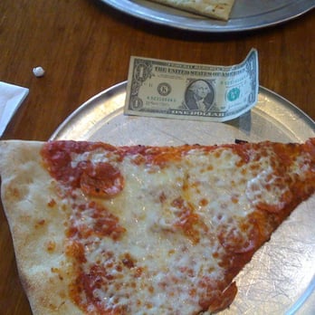 Classic Slice - The dollar is there for perspective. These slices are HUGE! - Pizza Near Me - Milwaukee, Wisconsin Classic Slice - The dollar is there for perspective. These slices are HUGE! - Pizza Near Me - Milwaukee, Wisconsin