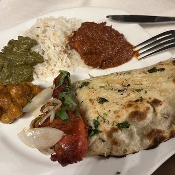 Saffron Indian Bistro - Garlic naan, tandoori chicken, shrimp vindaloo, saag paneer, and chana masala. - Indian Near Me - Oro Valley, Arizona Saffron Indian Bistro - Garlic naan, tandoori chicken, shrimp vindaloo, saag paneer, and chana masala. - Indian Near Me - Oro Valley, Arizona