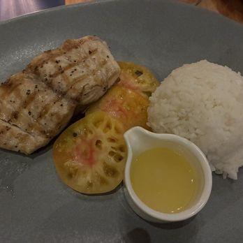 Tommy Bahama - Grilled Kampachi, heirloom tomatoes, sushi rice and lemon butter. - New American Near Me - Kamuela, Hawaii