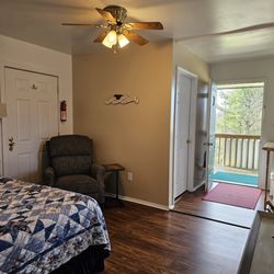 Fancy Gap Cabins And Campground - Our first motel room has a queen bed, recliner and Roku TV.