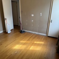 Bryant's Decorative Painting - Wall and baseboard before