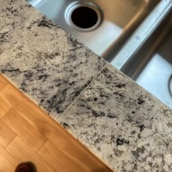 Carlos The Granite Guy - Ugly jagged cut seem.