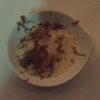 Schwa - The raviolo served without utensils. It tasted like truffle oil was added to the dish to amp up the flavor. The texture was a bit gummy. - New American Near Me - Chicago, Illinois Schwa - The raviolo served without utensils. It tasted like truffle oil was added to the dish to amp up the flavor. The texture was a bit gummy. - New American Near Me - Chicago, Illinois