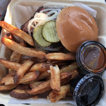 Landmark Smokehouse - Brisket sandwich with Kansas City sauce. - Bars Near Me - Cleveland, Ohio Landmark Smokehouse - Brisket sandwich with Kansas City sauce. - Bars Near Me - Cleveland, Ohio