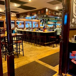 The Cambridge House Brew Pub - Looking toward the bar and seating area 1st floor, there's fancy table seating upstairs when that section is open