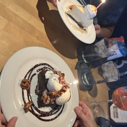 Cheesecake and warm brownie with ice cream Cheesecake and warm brownie with ice cream