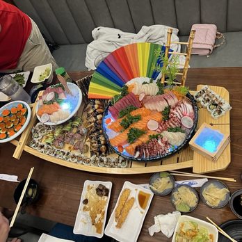 Sushi Island - Sushi boat with sashimi and sushi - Japanese Near Me - Winter Park, Florida Sushi Island - Sushi boat with sashimi and sushi - Japanese Near Me - Winter Park, Florida