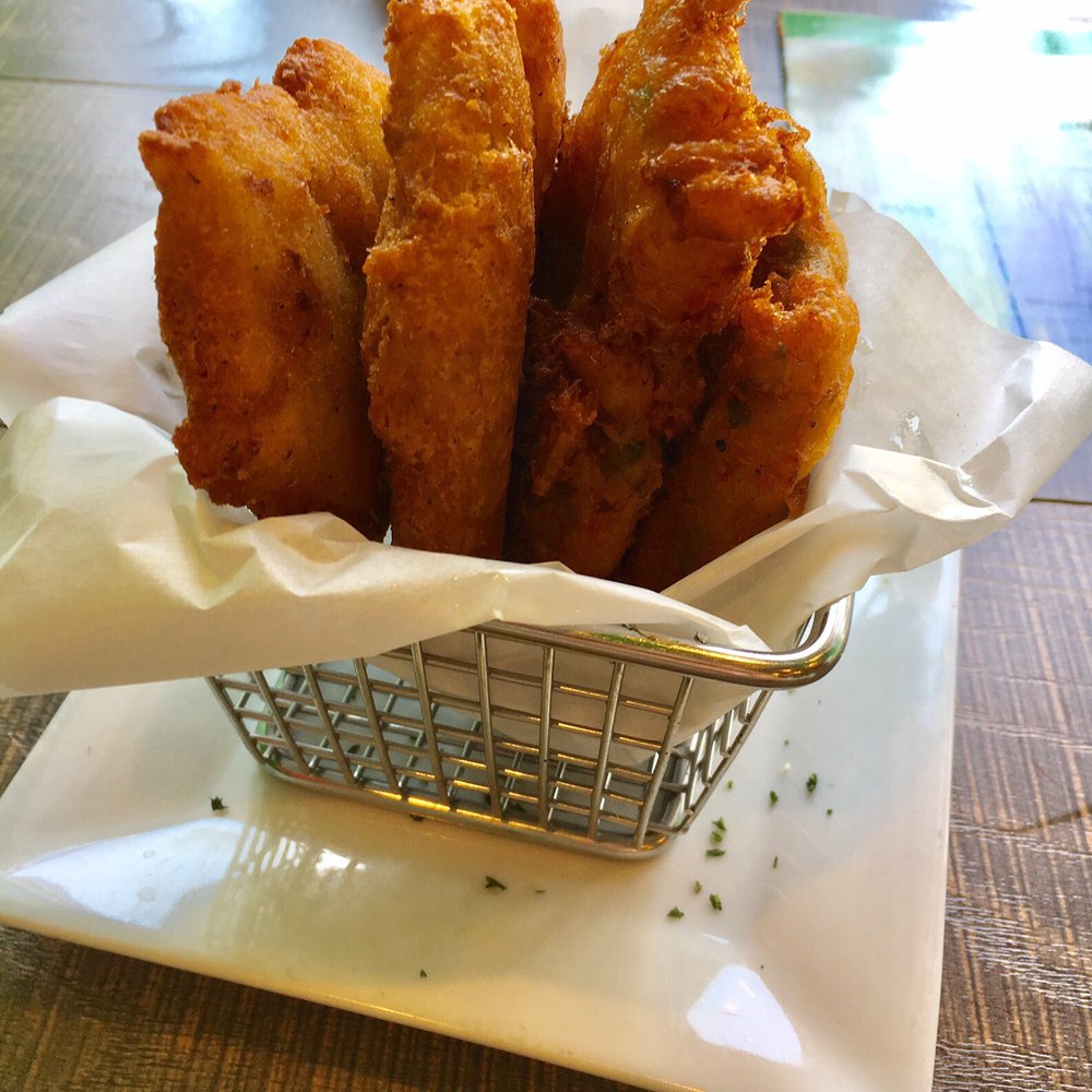 Ajo & Oregano - Deep~& Fried [Arepitas De Yuca W/ Aniseed & Bacalaítos- On Right. Translation: Yuca Fritters & Cod Fish Fritters]-Tasty - Dominican Near Me - Bronx, New York