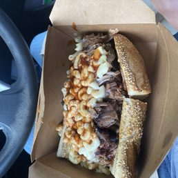 Big mamas special: brisket, pork, Mac n cheese on a long roll Big mamas special: brisket, pork, Mac n cheese on a long roll