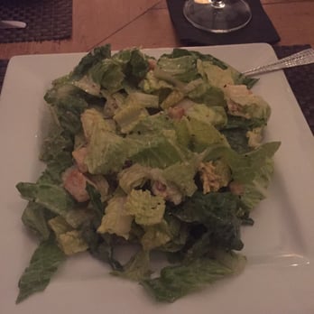 The Bluffton Room - Complete Caesar salad - prepared table-side. - New American Near Me - Bluffton, South Carolina The Bluffton Room - Complete Caesar salad - prepared table-side. - New American Near Me - Bluffton, South Carolina