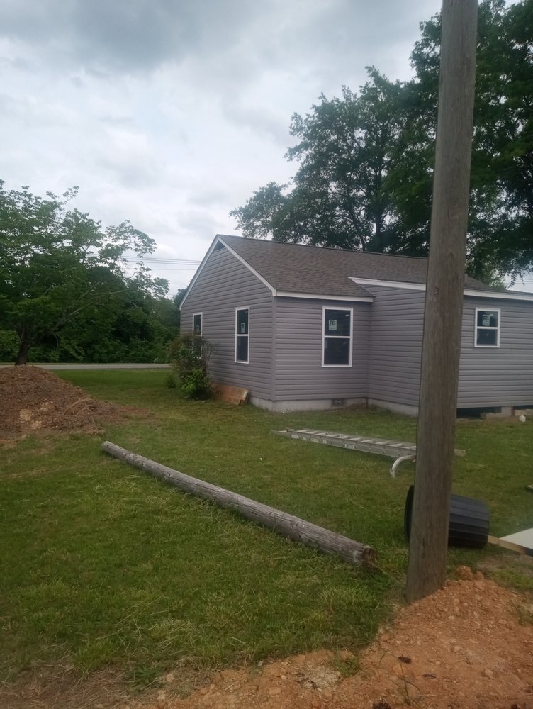 Slide of Roofing Worx