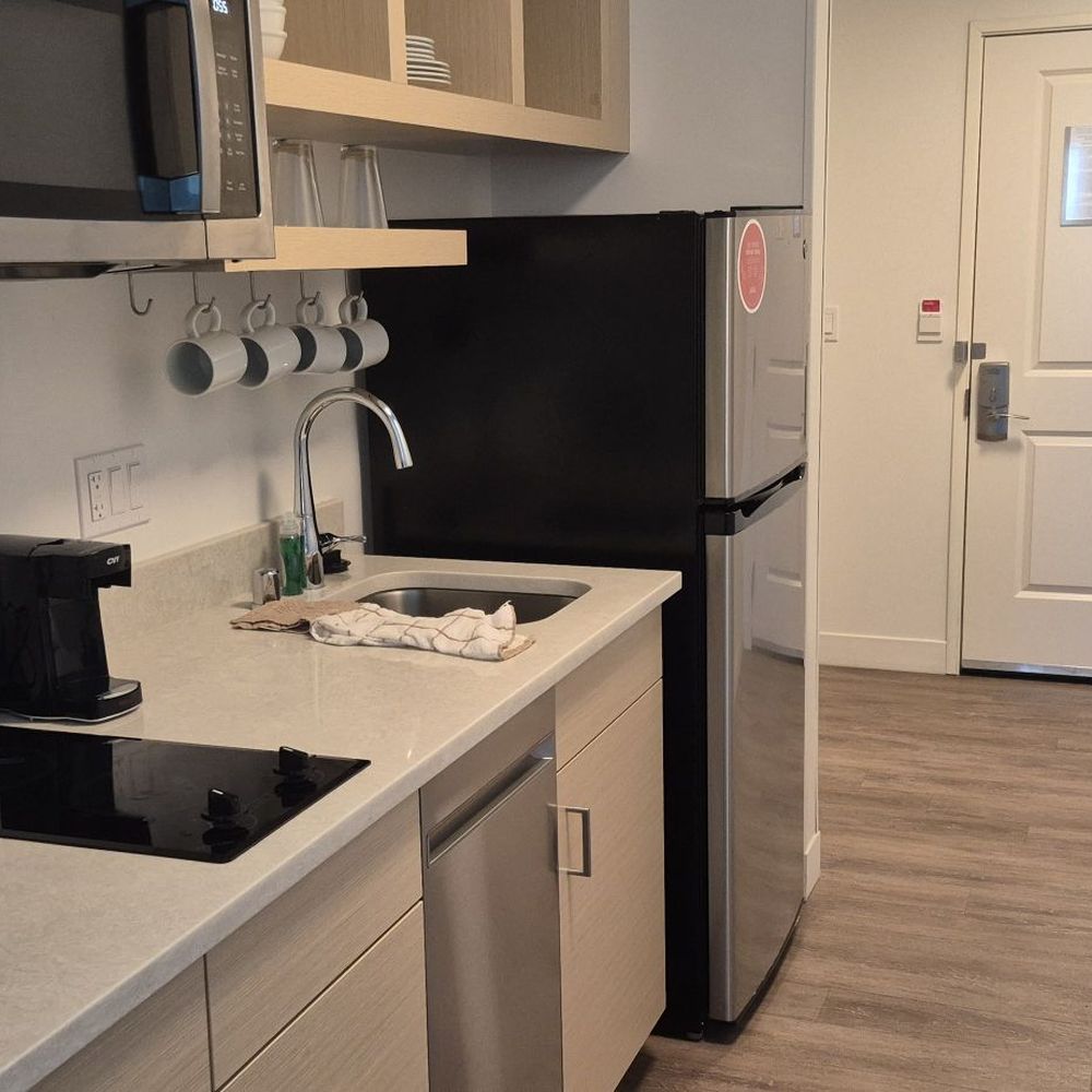 The room sleeps 4, so the kitchen included 4 of everything.