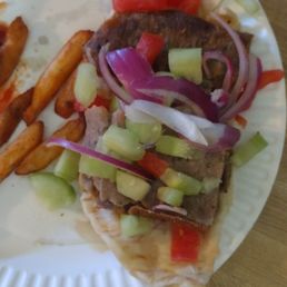 Soggy fries, few slices of lamb in the gyro