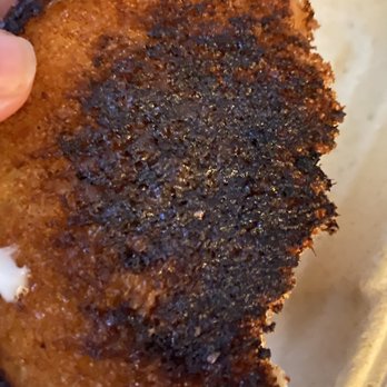 Burger Bar - a burnt piece of bread in a plastic container - Burgers Near Me - Colchester, Vermont Burger Bar - a burnt piece of bread in a plastic container - Burgers Near Me - Colchester, Vermont