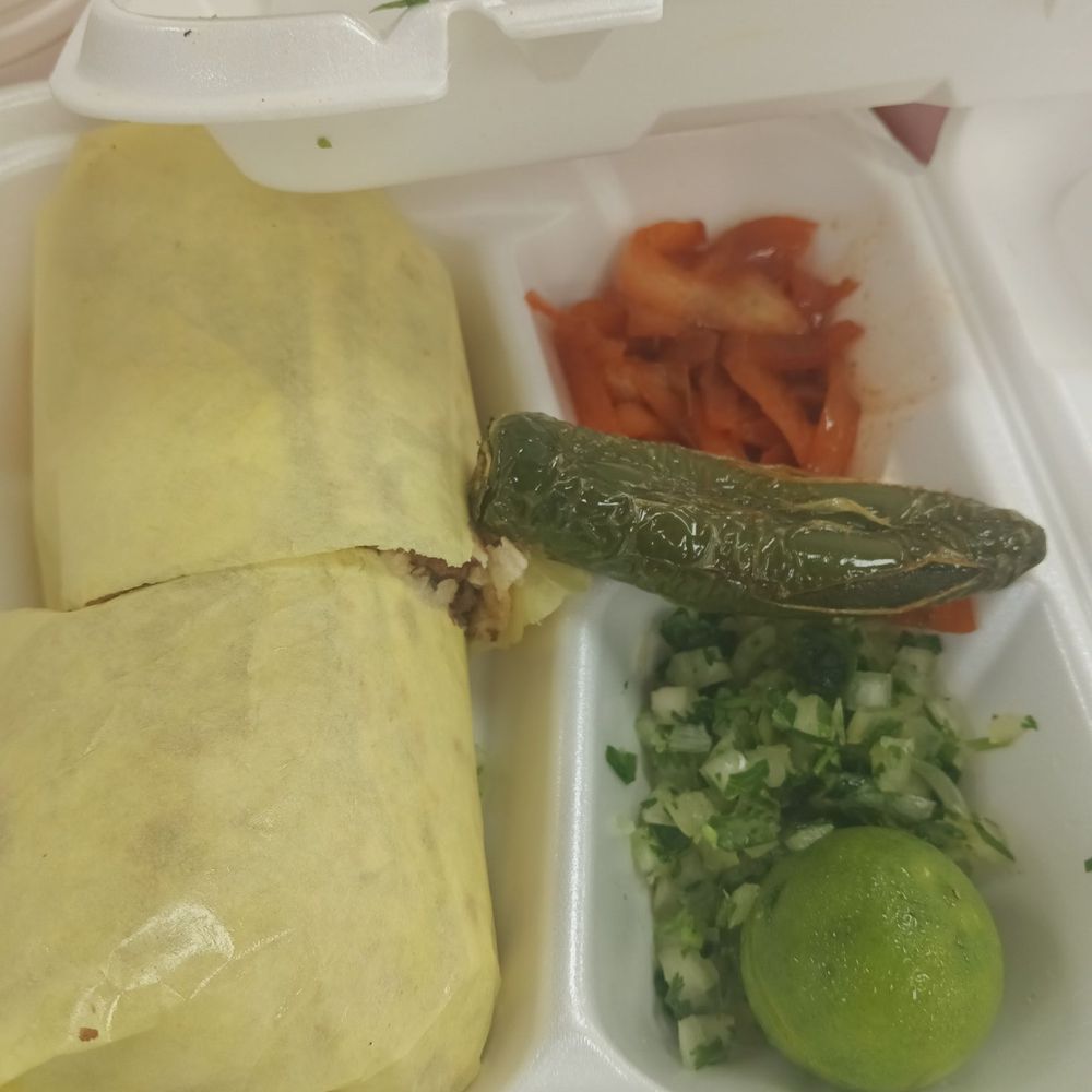 Well seasoned burrito (12$) filled with carne asada,I definitely will go back The only complaint is you have to pay for the salsa (4$) Well seasoned burrito (12$) filled with carne asada,I definitely will go back The only complaint is you have to pay for the salsa (4$)