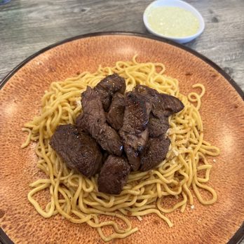 District 5 - House Garlic Noodles with Filet mignon - Noodles Near Me - Lake Forest, California District 5 - House Garlic Noodles with Filet mignon - Noodles Near Me - Lake Forest, California