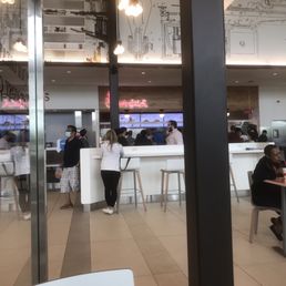 ows people eating at a restaurant