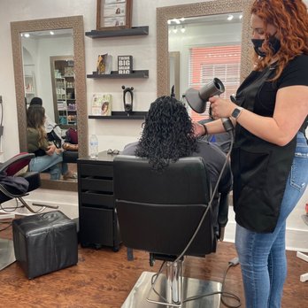 The Curl Whisperer - Sam finishing up drying my mom's hair - Hair Stylists Near Me - Miami, Florida